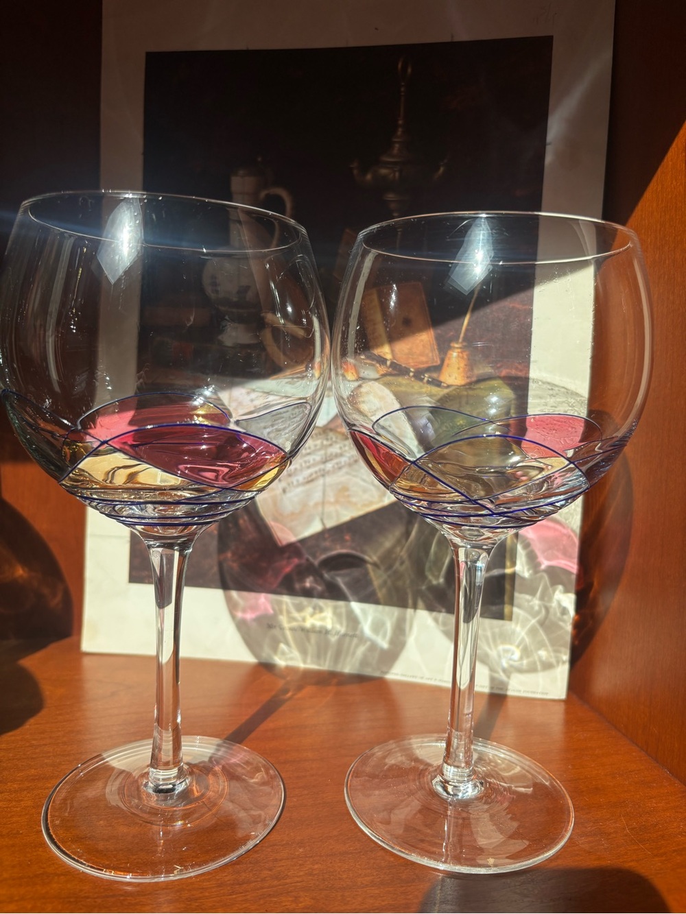 Stunning pair of "Wine Things" wine glasses with Milano cobalt blue line swirl